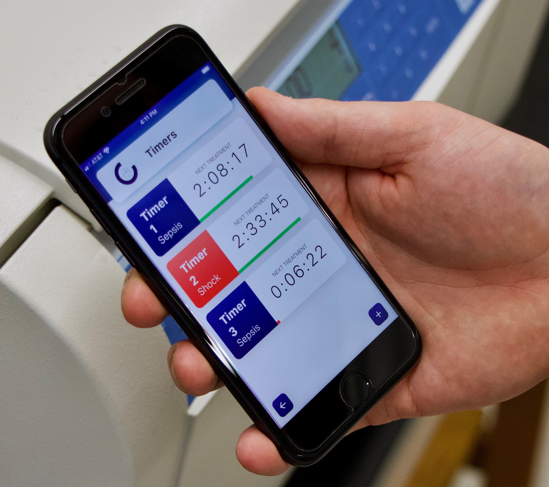 A close-up of the ChronoCare app on an iPhone shows three timers for sepsis and sepsis shock. 