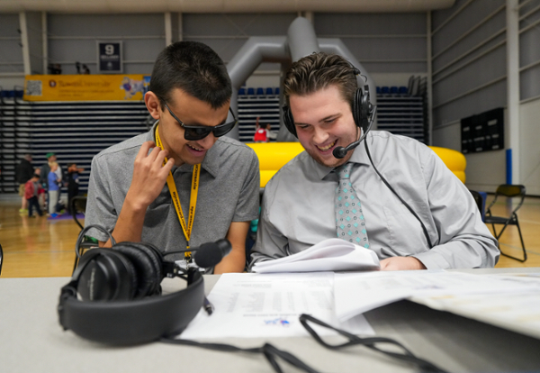 Visually imparired student Allan Wylie and his broadcast partner Aidan Dougherty call games in color.